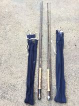 A Hardy two-piece 10ft 6in Graphite Deluxe fly rod with cloth sleeve; and a Hardy two-piece