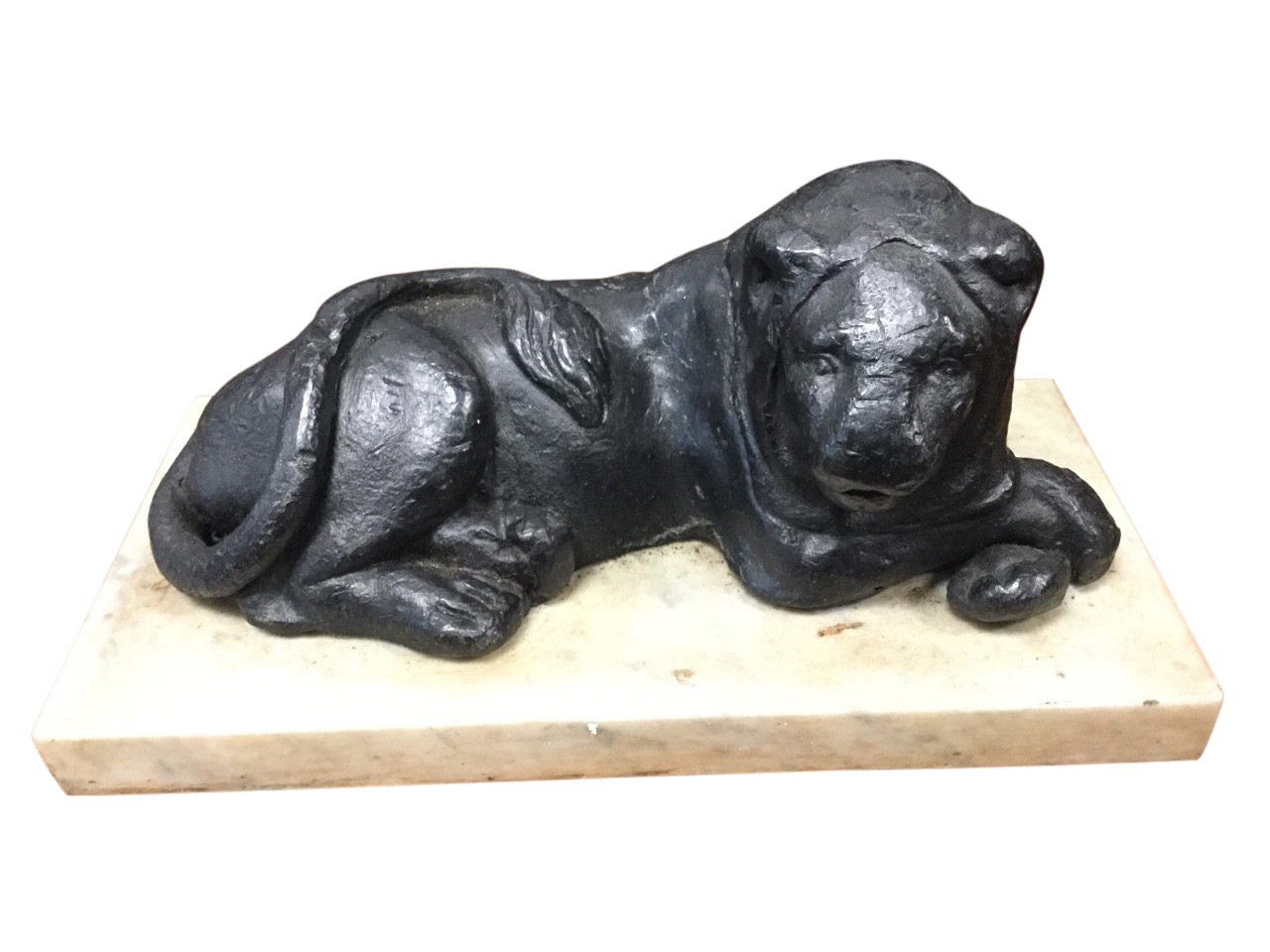 A pair of Victorian lead lions, the beasts lying on rectangular marble plinths with crossed paws. ( - Image 2 of 3