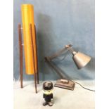 A mid-century teak framed tubular tablelamp with up-and-under light fittings in fibreglass shade; an