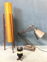 A mid-century teak framed tubular tablelamp with up-and-under light fittings in fibreglass shade; an