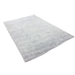 A contemporary textured grey synthetic fibre carpet. (118in x 79in)