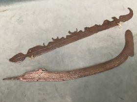 Two ancient Chinese pole weapon blades, with traces of chiselled decoration. (23.5in & 22in)