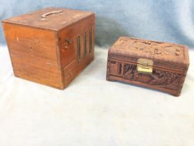 A Victorian mahogany box with brass mounts, opening to compartments with secondary access