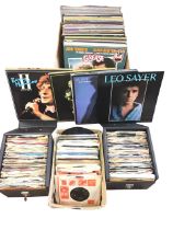 A collection of assorted vinyl LPs and 45s, including pop and rock including David Bowie, Jethro