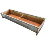 A rectangular galvanised water trough with flat rim. (60in x 18in x 10in)