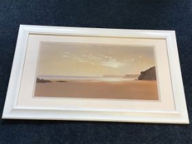 An unsigned lithographic print of beach with cliffs in the distance, titled Beyond the Breaker 1