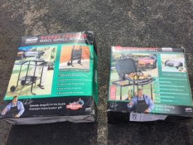 A Boxed George Foreman Double Champion indoor/outdoor electric BBQ grill, and a boxed George Foreman