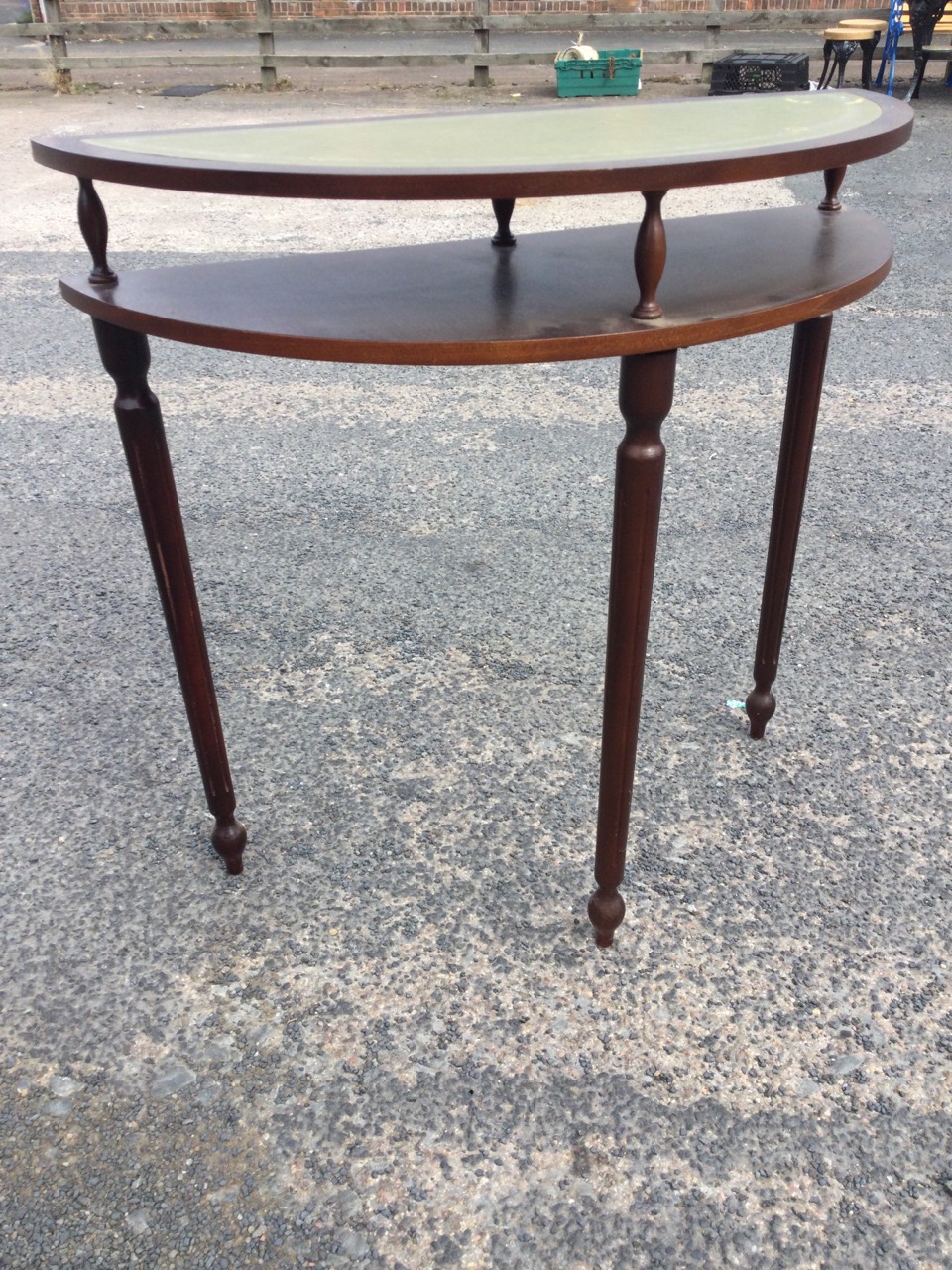 A mahogany demi-lune hall table with gilt tooled leather skiver to top raised on spindles above a - Image 3 of 3