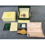 A cased stainless steel Rolex style Daytona Oyster Perpetual watch, with paperwork, certificates,