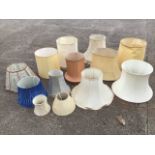 A collection of miscellaneous lampshades - striped, pleated, cylindrical, vellum, some with tasseled