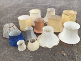 A collection of miscellaneous lampshades - striped, pleated, cylindrical, vellum, some with tasseled