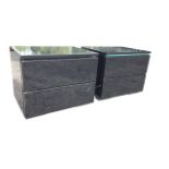 A pair of contemporary black high gloss bedside cabinets, the rectangular tops above two drawers,