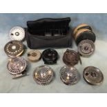 A box of miscellaneous fly reels and spools - Orvis, Balzer, an old bakelite reel, Ron Thompson