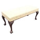 An Edwardian mahogany Georgian style window seat, the rectangular upholstered seat raised on