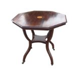 An Edwardian mahogany octagonal occasional table, the moulded top inlaid with a circular fan motif