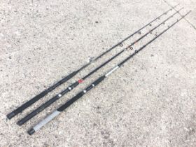 A South Bend 9ft composite graphite Black Beauty two-piece spinning rod; a Shakespeare Contender 9ft