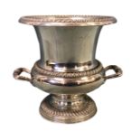 A silver plated campana form wine cooler, with gadrooned rim, shoulder and foliate cast handles. (