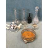 A pair of fern engraved decanters & stoppers with tall chamfered necks; an Alnwick beer bottle; a