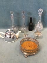 A pair of fern engraved decanters & stoppers with tall chamfered necks; an Alnwick beer bottle; a