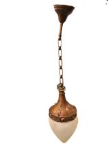 An Edwardian hall lantern, the patinated bell shaped rose with chain suspending an inverted funnel