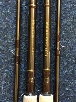 A pair of new unused Fluff Chucker 8ft two-piece carbon fibre fly rods. (2)