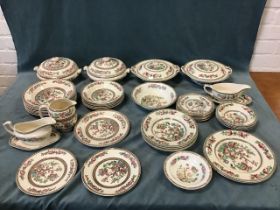 An Indian Tree dinner service by Johnson Bros and Bigwood, including tureens & covers, sauceboats,