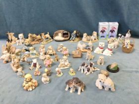 A collection of moulded ceramic and resin dogs & bears - some handpainted, Sherratt & Simpson,