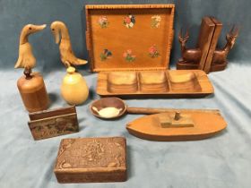 Miscellaneous treen - a carved cigarette box, trays, a model boat, turned jars & covers, a pair of