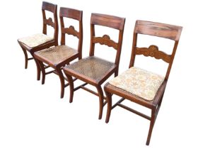 A set of four 19th century Dutch fruitwood dining chairs, the tablet backs above shaped inlaid rails