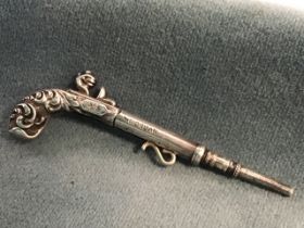 A miniature silver propelling pencil by Samuel Mordan, the novelty modelled as a flintlock pistol