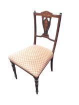 An Edwardian mahogany parlour chair, the inlaid crestrail and pierced splat above an upholstered