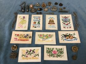 Miscellaneous military badges, two ARP whistles, coins, albert chains, brooches, nine WW1 postcard