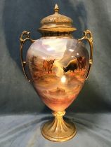 A large Crown Devon Fielding egg shaped vase & cover, painted with highland cattle scene in