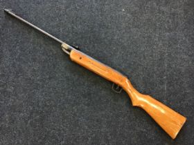 A .22 air rifle with beech stock. (42.75in)