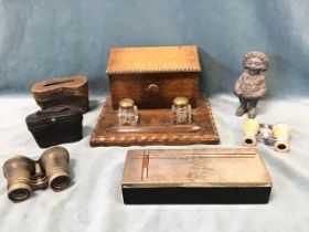 An rectangular oak desk tidy with integral stationery box, inkwells and pen tray; a Victorian