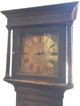 An eighteenth century oak longcase clock with movement by Thomas Reynolds of Warwick, the engraved