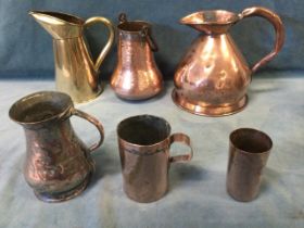 Five nineteenth century copper vessels - a harvest jug, two tankards, a beaker, a hand-beaten pot