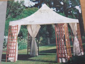 A boxed Homebase gazebo, the 3m by 3m Knightsbridge hardwood model with water resistant canopy, side