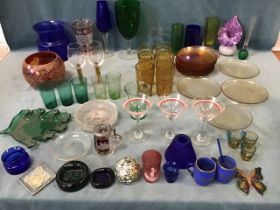 A quantity of coloured glass including vases, drinking glasses, cut German ruby, a hunting