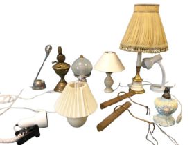 Five miscellaneous tablelamps - reading, alabaster, porcelain moulded with winged cherubs, brass oil