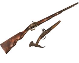 A replica flintlock musket with engraving to lock; and a flintlock pistol with scrolled hammer and
