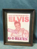 An Elvis Presley advertising sign, the enamelled panel in moulded frame - some re-painting. (15.25in