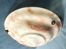 A circular sepia veined alabaster plaffonier of bowl shape with three button mounts, suspended by