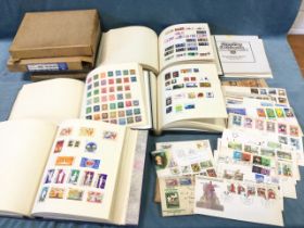 A stamp collection contained in four Stanley Gibbons loose leaf Exeter albums containing stamps of