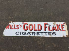 A rectangular enamelled Wills Gold Flake cigarettes advertising sign. (60.in x 15in)