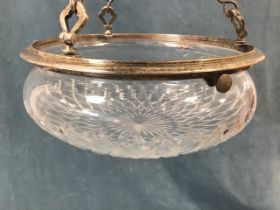 A cut glass plaffonier of bowl shape with silver plated mounts, suspended by three chains on