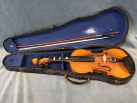 A hard cased contemporary violin & bow, with fitted interior. (22.25in)