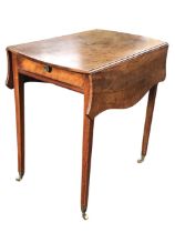 A late 18th century Hepplewhite mahogany pembroke table, the serpentine top with two leaves