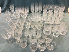 A large quantity of cut drinking glasses including Edinburgh Crystal, wine glasses, tumblers,