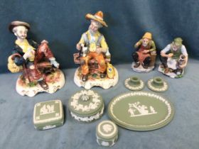 Two pairs of Italian Capo-di-Monte style men figurines; and a collection of green Wedgwood jasper